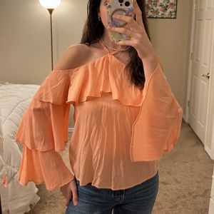 Orange flowy Express shirt with long sleeves and cross neck size small